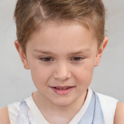 Joyful white child male with short  brown hair and brown eyes