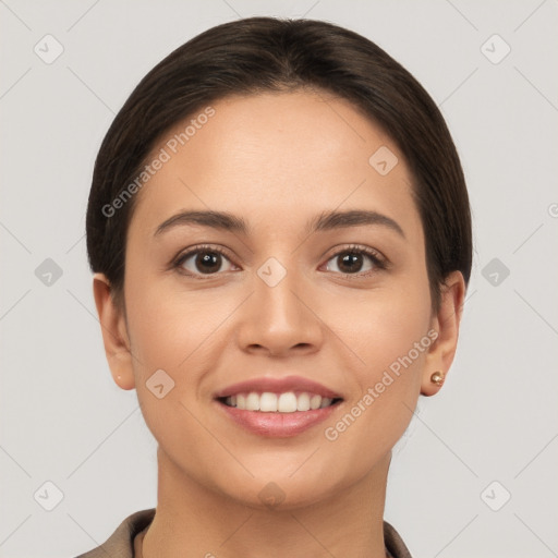 Joyful white young-adult female with short  brown hair and brown eyes