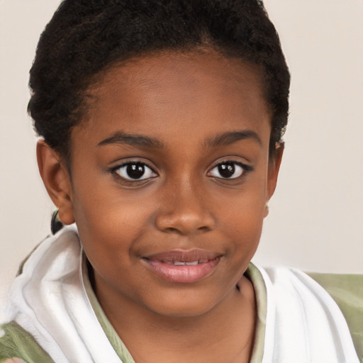 Joyful black child female with short  brown hair and brown eyes