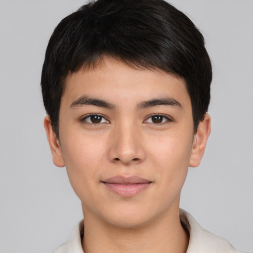 Joyful asian young-adult male with short  brown hair and brown eyes