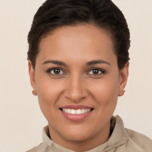 Joyful white young-adult female with short  brown hair and brown eyes