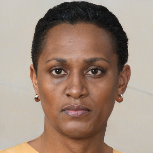 Neutral black young-adult female with short  brown hair and brown eyes