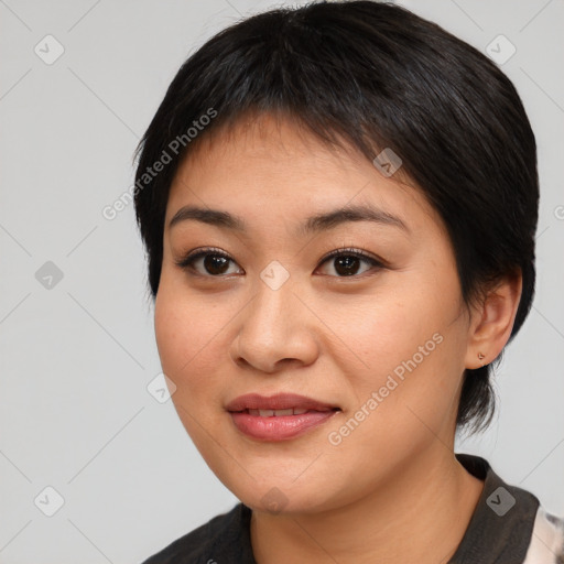 Joyful asian young-adult female with medium  brown hair and brown eyes