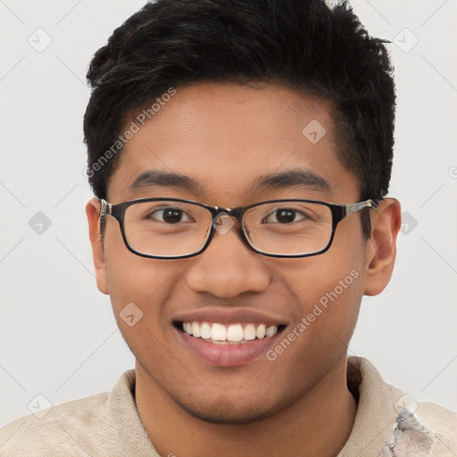 Joyful latino young-adult male with short  brown hair and brown eyes