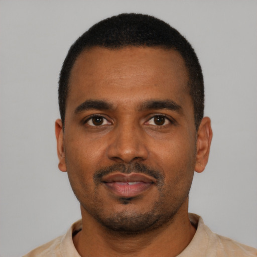 Neutral black young-adult male with short  black hair and brown eyes