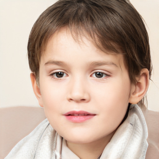 Joyful white child female with short  brown hair and brown eyes