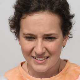 Joyful white adult female with short  brown hair and brown eyes