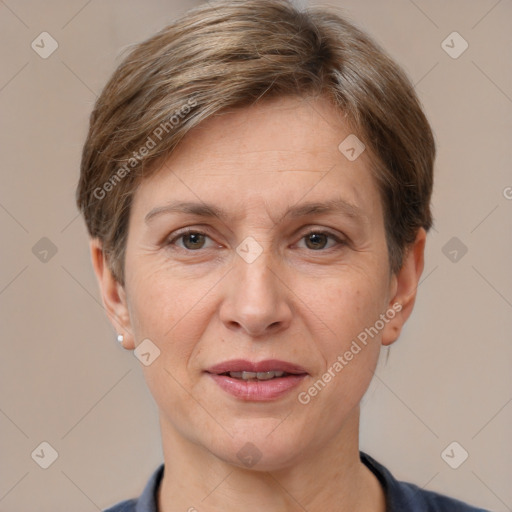 Joyful white adult female with short  brown hair and grey eyes