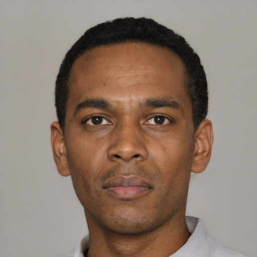 Neutral black young-adult male with short  black hair and brown eyes