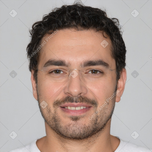 Joyful white young-adult male with short  black hair and brown eyes