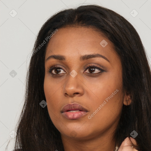 Neutral white young-adult female with long  brown hair and brown eyes