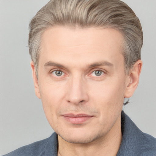 Neutral white adult male with short  brown hair and grey eyes