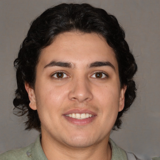 Joyful white young-adult male with medium  brown hair and brown eyes