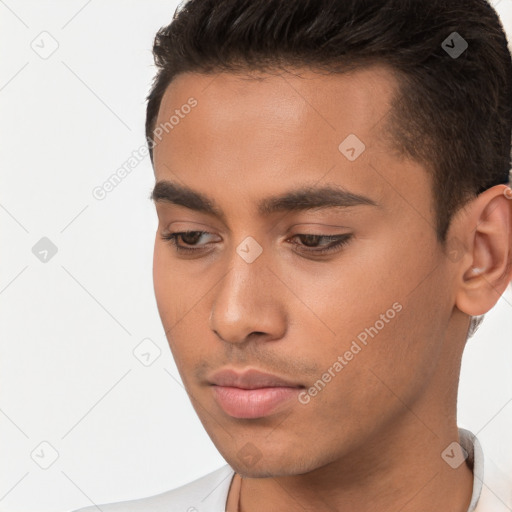 Neutral white young-adult male with short  brown hair and brown eyes