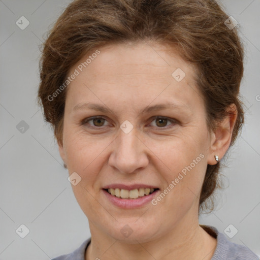 Joyful white adult female with short  brown hair and brown eyes