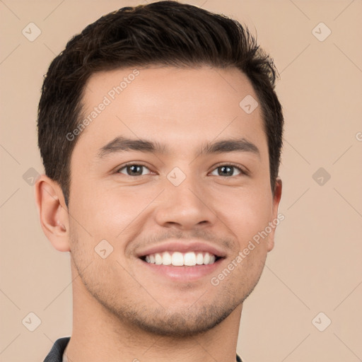 Joyful white young-adult male with short  brown hair and brown eyes