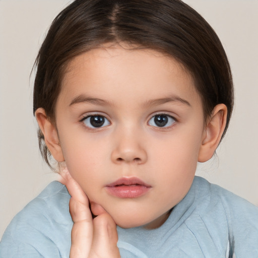 Neutral white child female with medium  brown hair and brown eyes