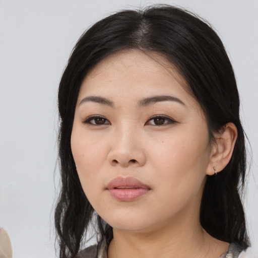 Neutral asian young-adult female with medium  black hair and brown eyes