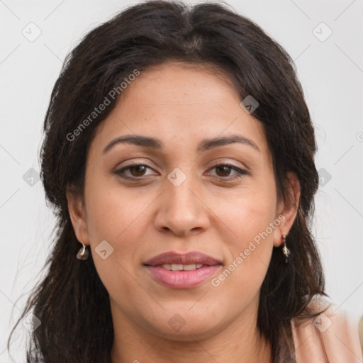 Joyful white adult female with long  brown hair and brown eyes