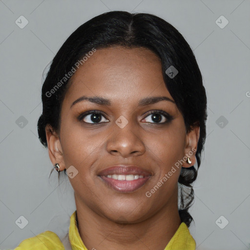 Joyful black young-adult female with medium  black hair and brown eyes