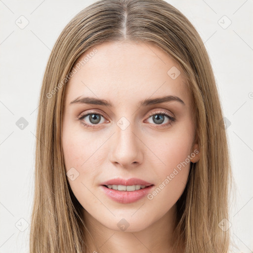 Joyful white young-adult female with long  brown hair and green eyes