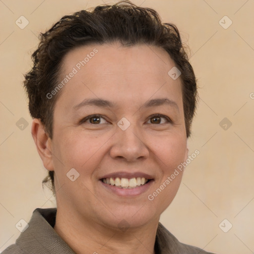 Joyful white adult female with short  brown hair and brown eyes