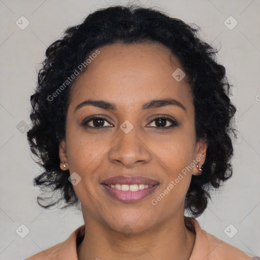 Joyful black young-adult female with medium  brown hair and brown eyes