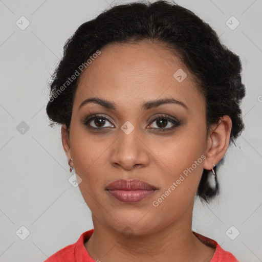 Joyful latino young-adult female with short  brown hair and brown eyes