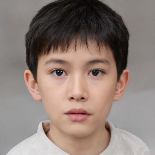 Neutral white child male with short  brown hair and brown eyes