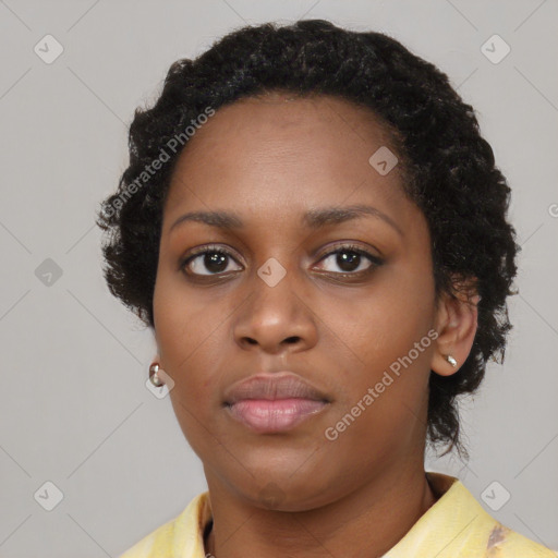 Neutral black young-adult female with short  black hair and brown eyes