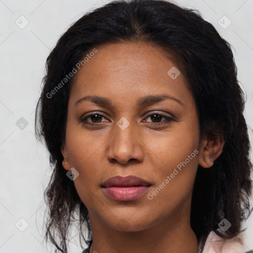 Joyful latino young-adult female with long  brown hair and brown eyes