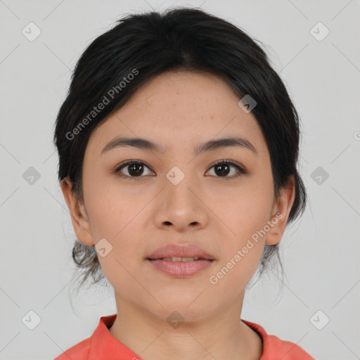 Joyful asian young-adult female with medium  black hair and brown eyes