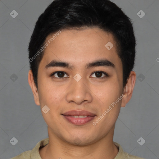Joyful latino young-adult male with short  brown hair and brown eyes