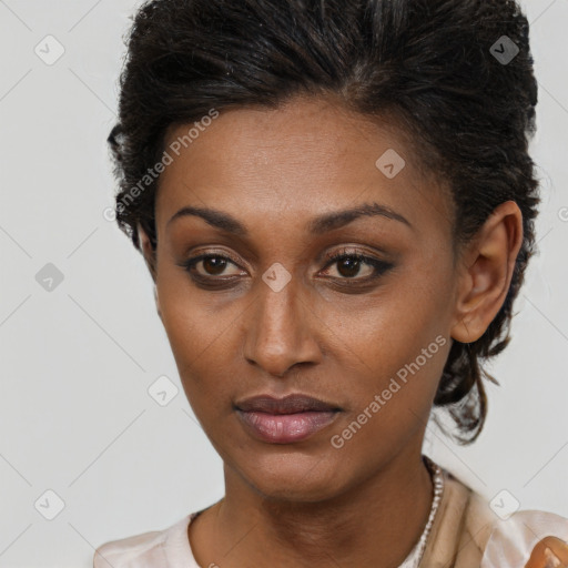 Neutral black young-adult female with short  brown hair and brown eyes