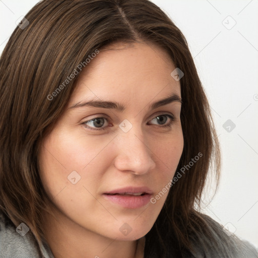 Neutral white young-adult female with long  brown hair and grey eyes