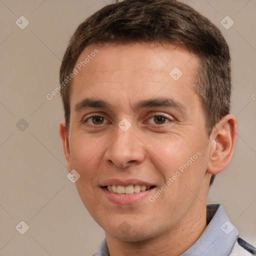 Joyful white adult male with short  brown hair and brown eyes