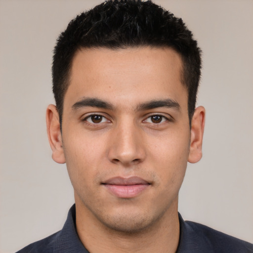 Neutral white young-adult male with short  black hair and brown eyes