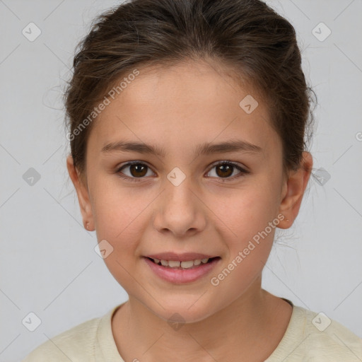 Joyful white child female with short  brown hair and brown eyes