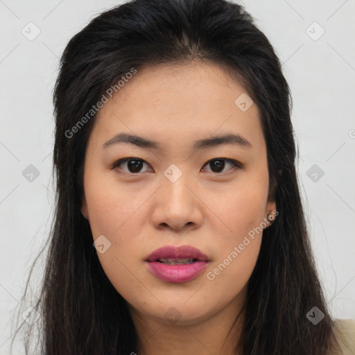 Joyful asian young-adult female with long  brown hair and brown eyes