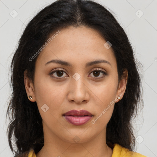 Joyful latino young-adult female with long  brown hair and brown eyes