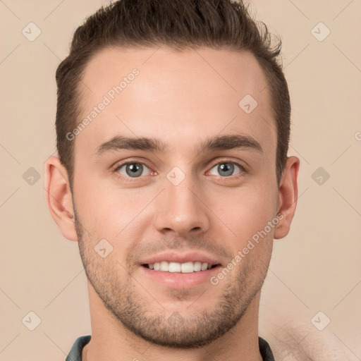 Joyful white young-adult male with short  brown hair and brown eyes