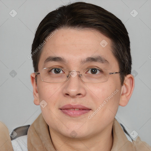 Joyful asian adult male with short  brown hair and brown eyes