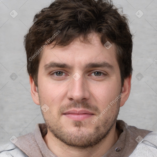 Neutral white young-adult male with short  brown hair and grey eyes