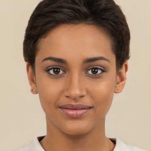 Joyful white young-adult female with short  brown hair and brown eyes