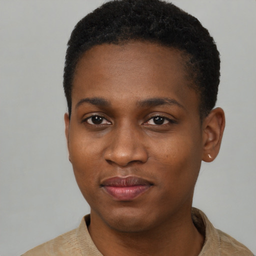 Joyful black young-adult female with short  black hair and brown eyes