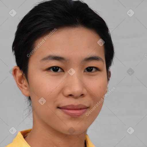 Joyful asian young-adult female with short  brown hair and brown eyes