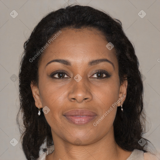 Joyful black adult female with medium  brown hair and brown eyes