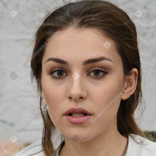 Neutral white young-adult female with medium  brown hair and brown eyes