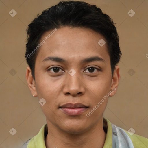 Joyful latino young-adult male with short  black hair and brown eyes