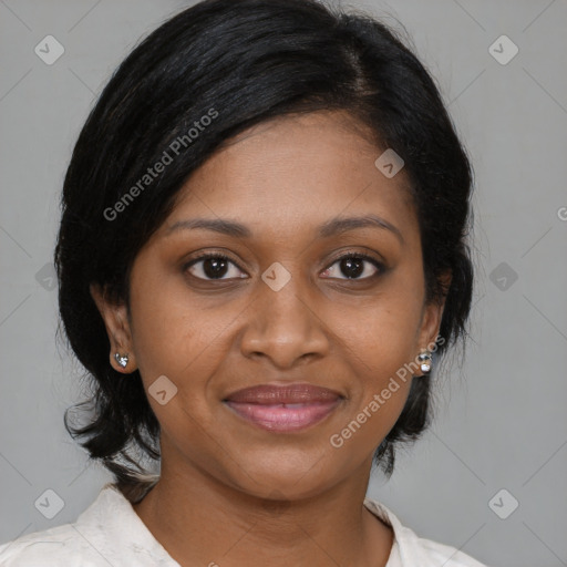 Joyful black young-adult female with medium  brown hair and brown eyes